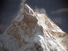 13 Masherbrum Close Up In Late Afternoon Sun From Goro II The clouds started to lift at our camp at Goro II on the Baltoro Glacier and I got my first spectacular view of Masherbrum (7821m, the 24th highest peak in the world). Originally called K1, Masherbrum is a spectacular rock and ice peak, rising to the south of the Baltoro Glacier.